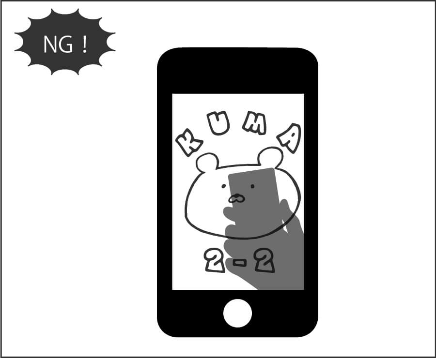 スマホで撮影した写真に撮影者の影が入った図
